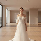 Close-up of a white tulle dress with sheer sleeves on a blurred background