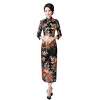 Woman in a floral dress standing in a room with decorative elements.