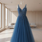 Woman wearing a blue evening gown with a city street background