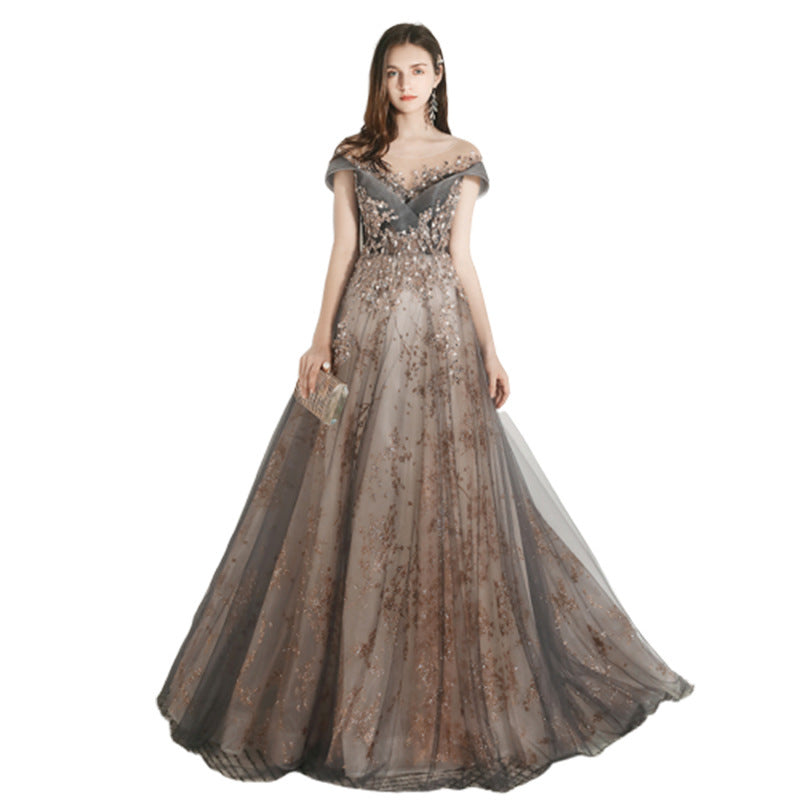Elegant evening gown with floral patterns on a white background