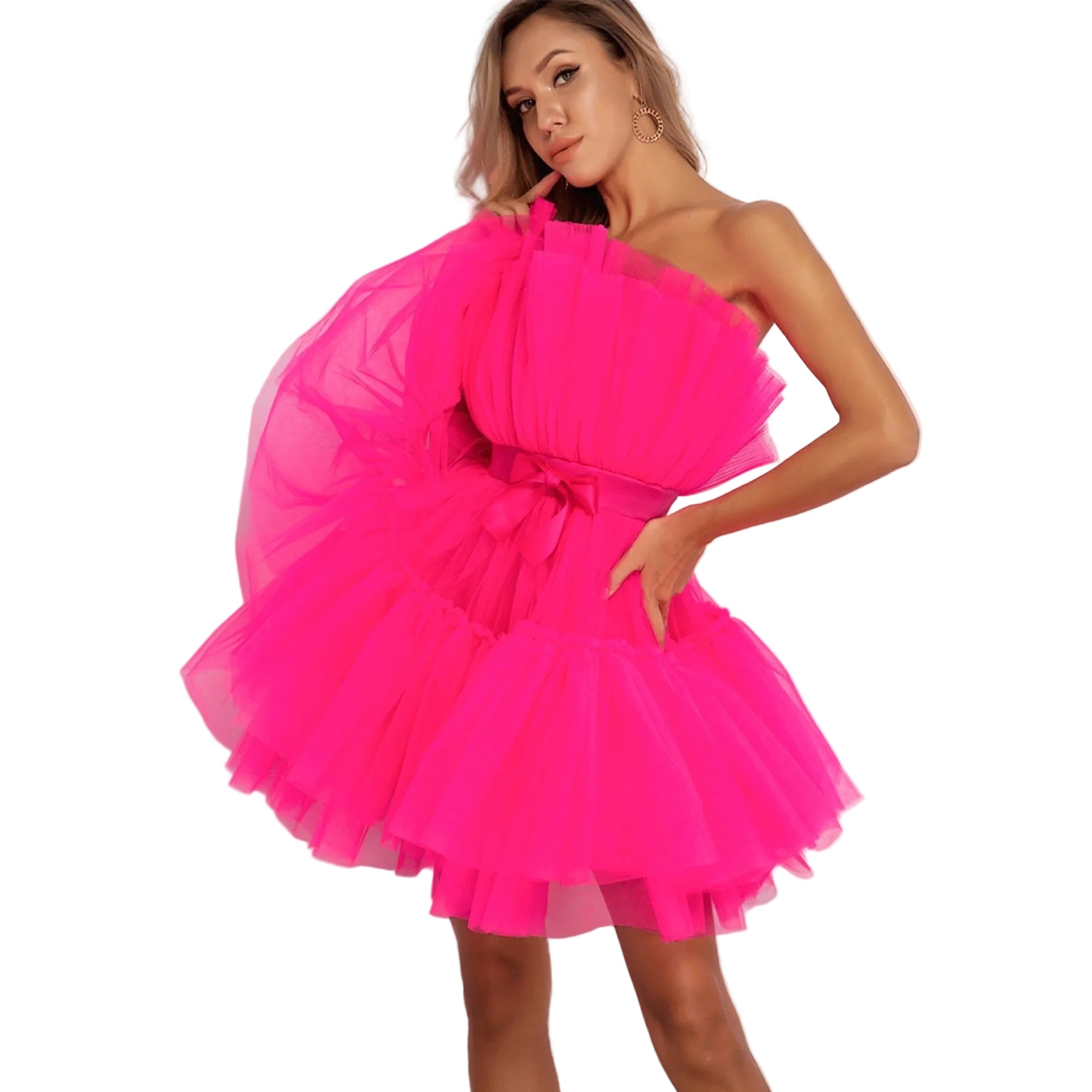 Woman wearing a bright pink one-shoulder dress against a plain background