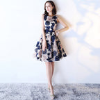 Woman wearing a floral dress against a white background